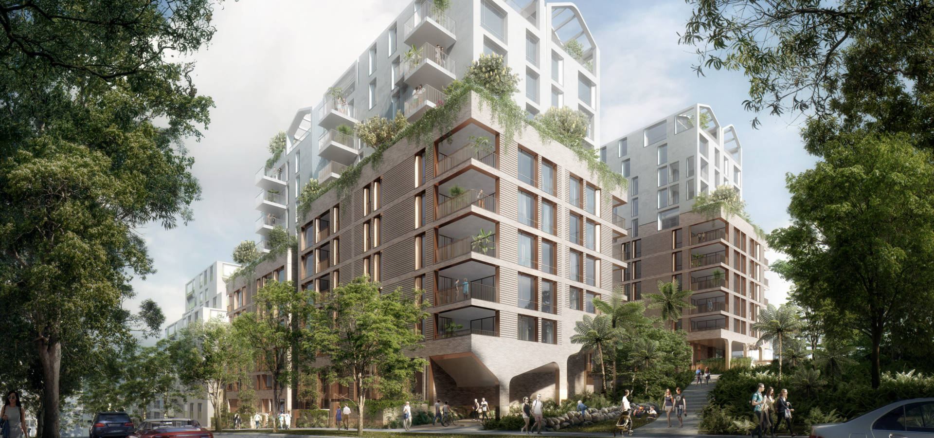 A residential building with trees and people walking around.